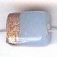 Glaskraal blokje 10x8mm lichtblauw/goud 25st